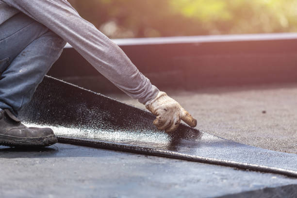 Professional Basement Waterproofing technician working in Marion, MI